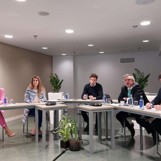 Margarida Maia Marta Marquéz Claudio Panunzio Hugo Velez Juan Ramón from left to right seated at table conference streaming event internal Hipoges Global Town Hall 2022 growth ambition expansion REOs NPL servicer